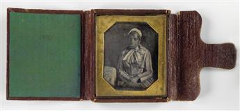 (AFRICAN AMERICANS) Group of 4 hard images, including a sixth-plate daguerreotype portrait of an African American woman.